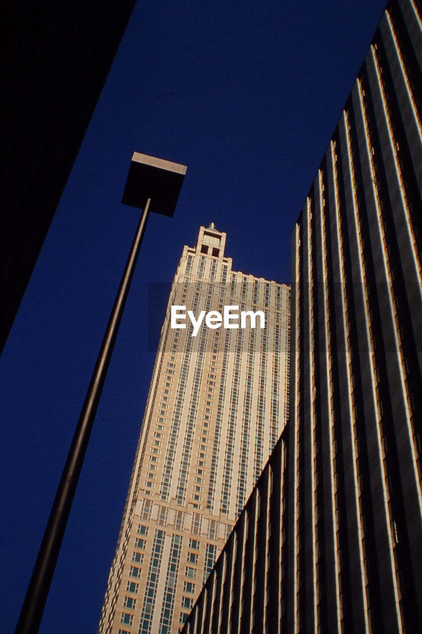 LOW ANGLE VIEW OF SKYSCRAPERS