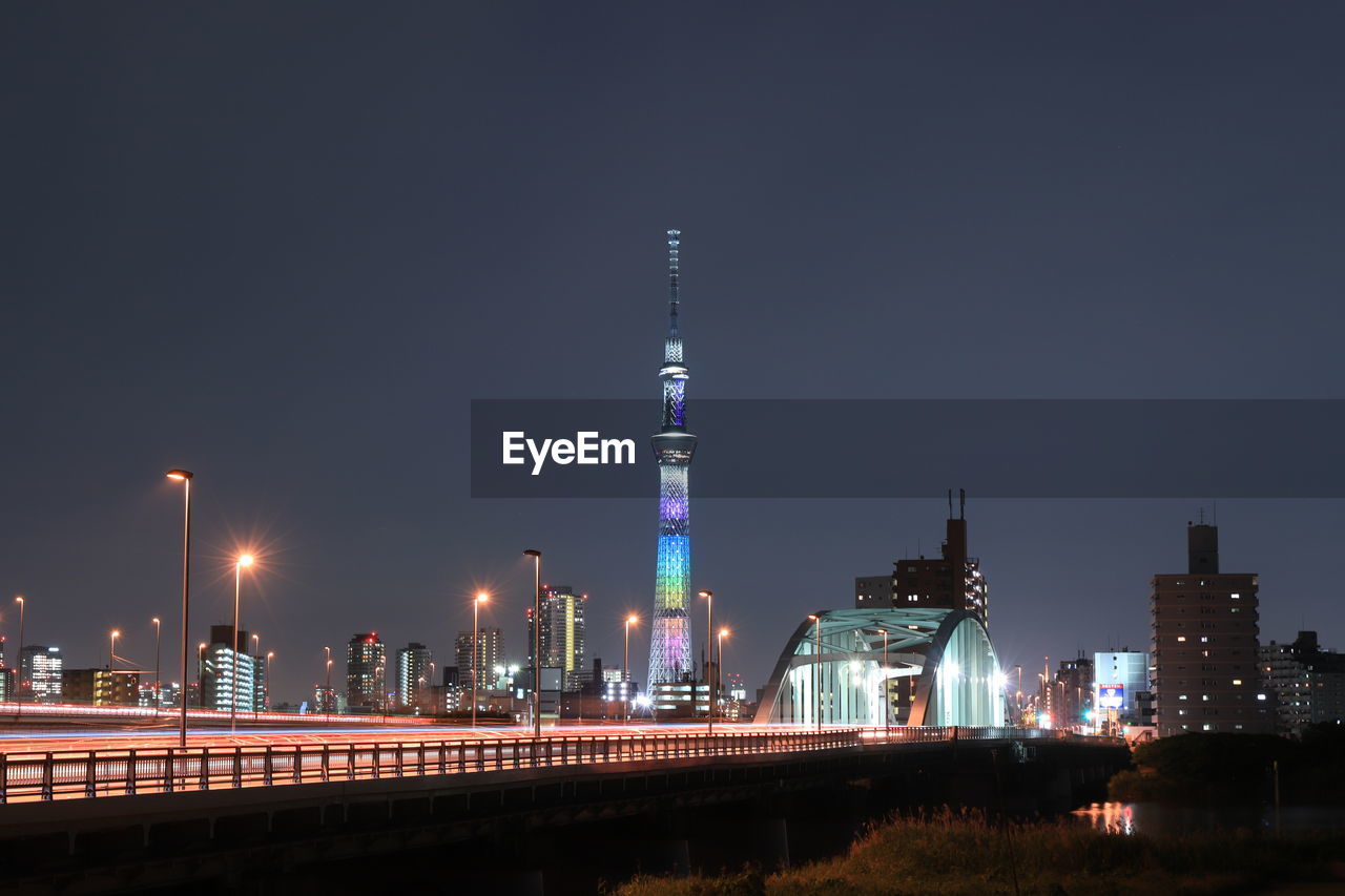 Illuminated buildings in city at night