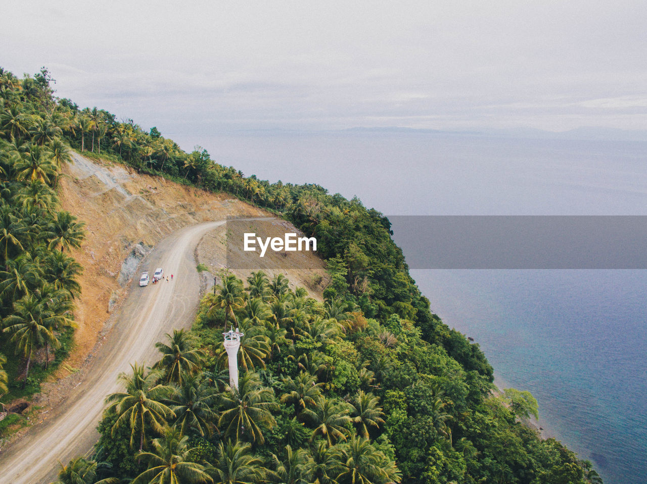 High angle view of road by sea against sky