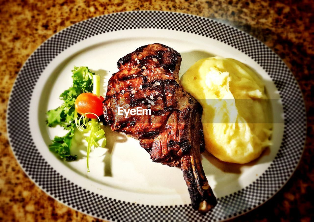 CLOSE-UP OF FOOD SERVED ON PLATE