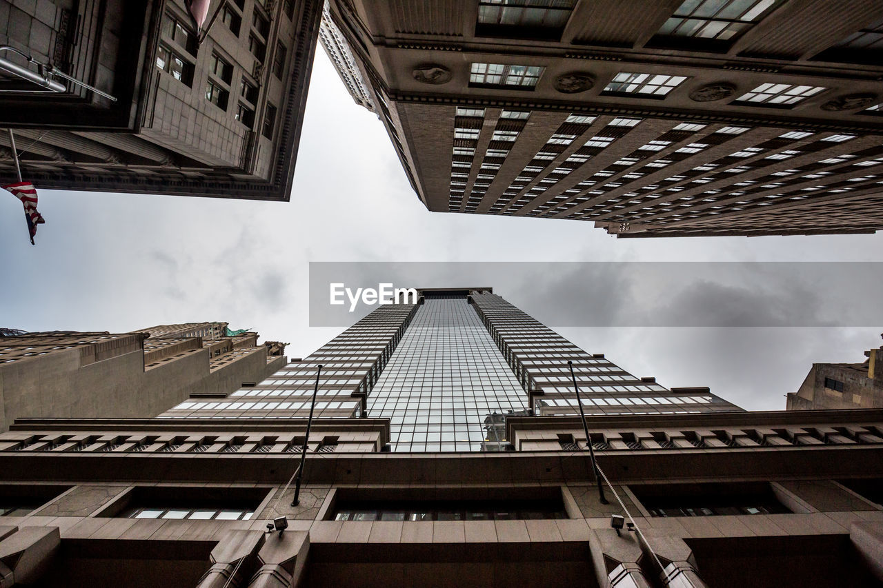 Low angle view of skyscrapers against sky