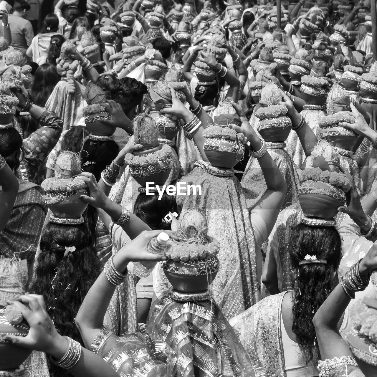 Women with kalash on head during jagannath temple mangal kalash yatra, indian hindu devotees