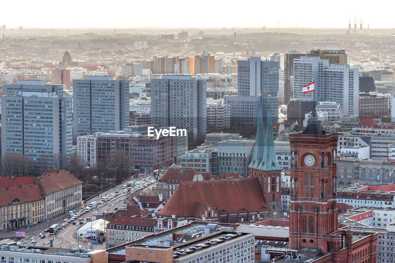 High angle view of modern buildings in city against sky