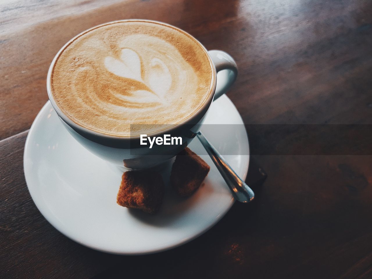 High angle view of cappuccino on table