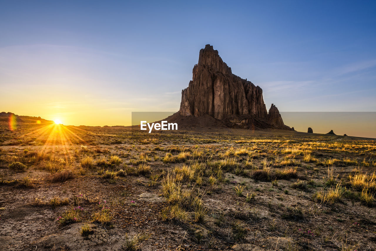 SCENIC VIEW OF ROCK FORMATIONS AGAINST SKY