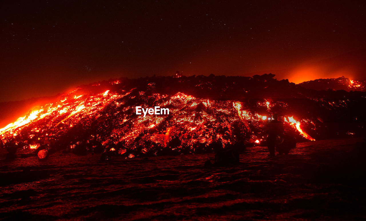 Lava flow on etna volcano during a eruption - sicily