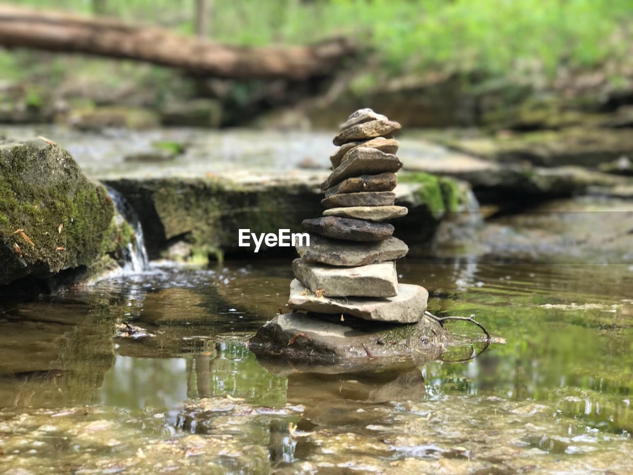 CLOSE-UP OF STACK OF ROCKS