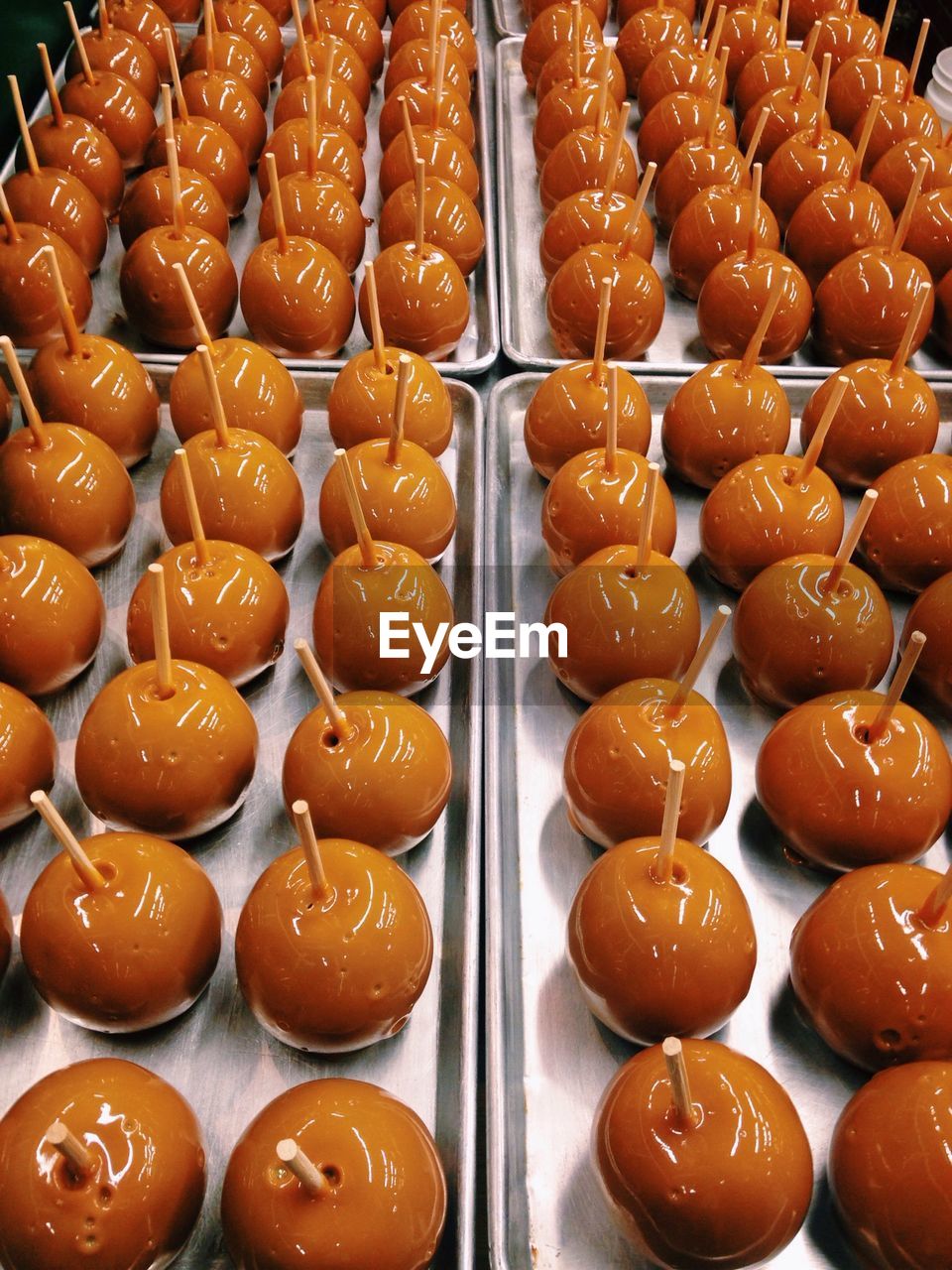High angle view of caramel apples on tray