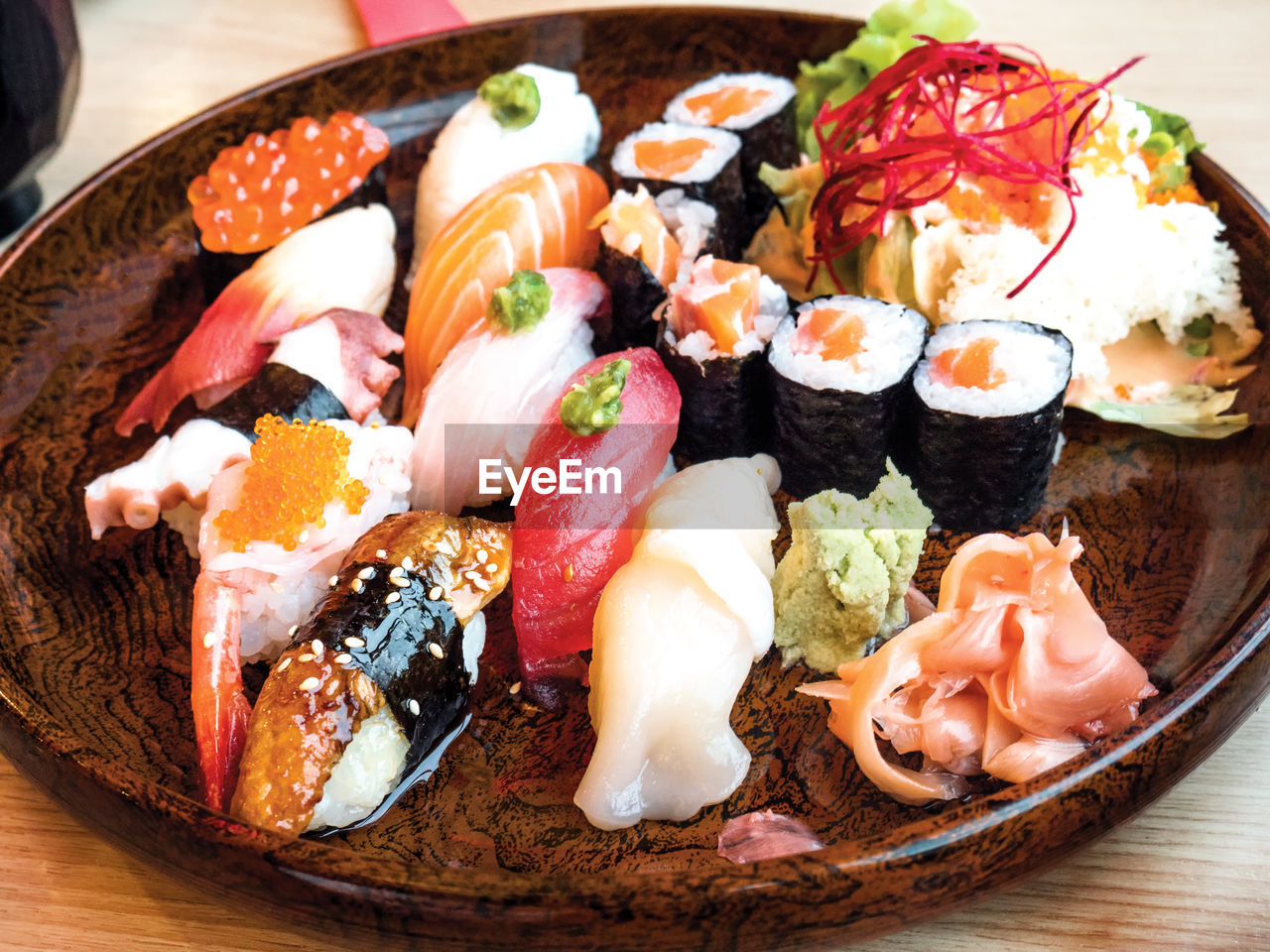 CLOSE-UP OF SUSHI SERVED ON PLATE