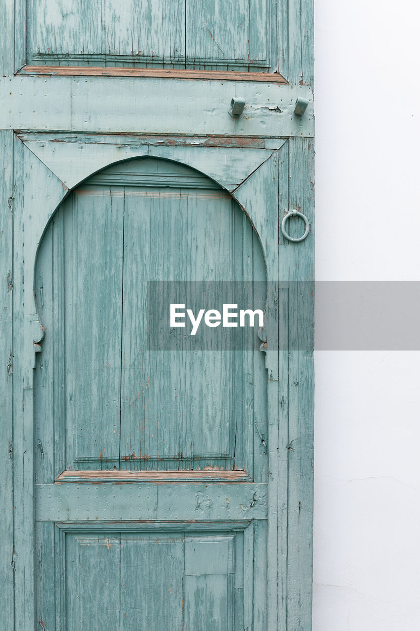 Closed door of old house