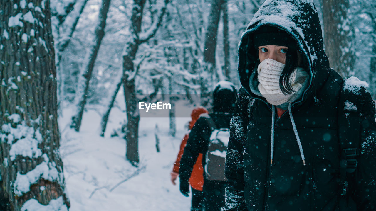 Portrait of woman wearing warm clothing during winter