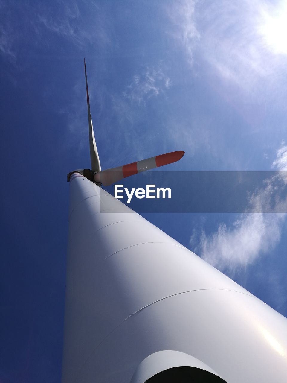 Low angle view of windmill against sky