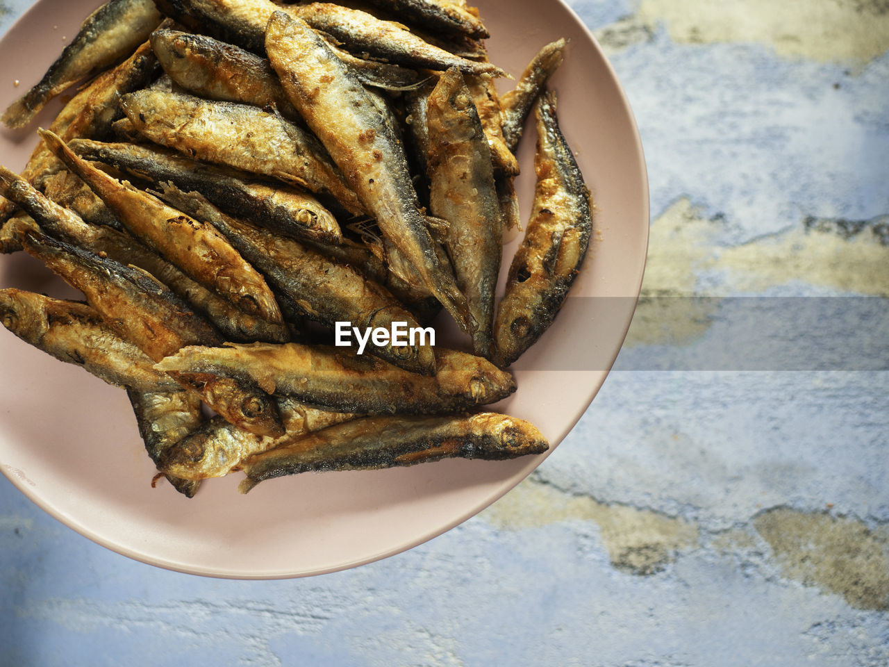 Fried herring on a plate