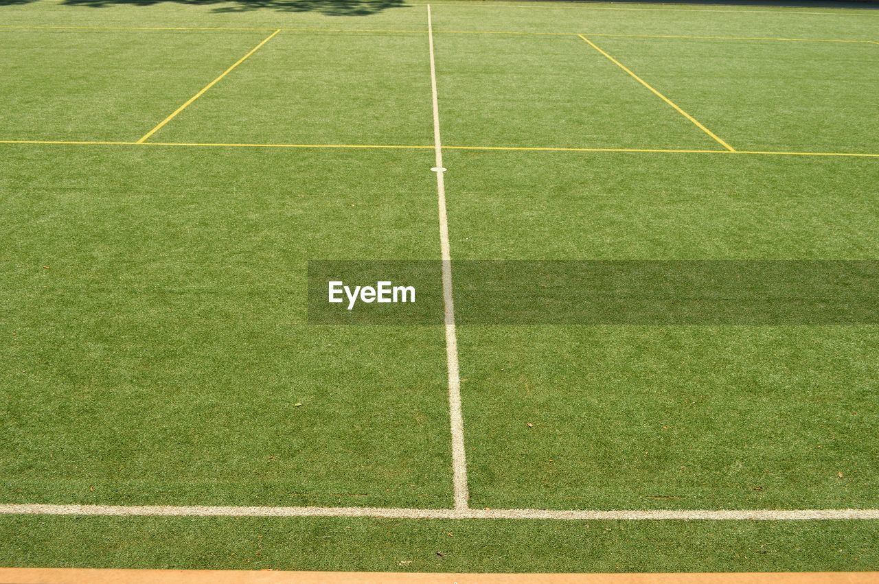 High angle view of soccer field during sunny day