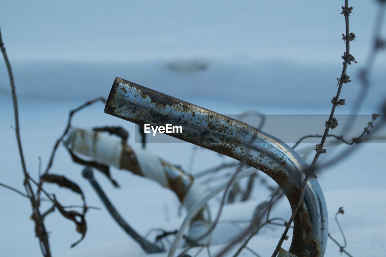 Close-up of abandoned bicycle handlebar