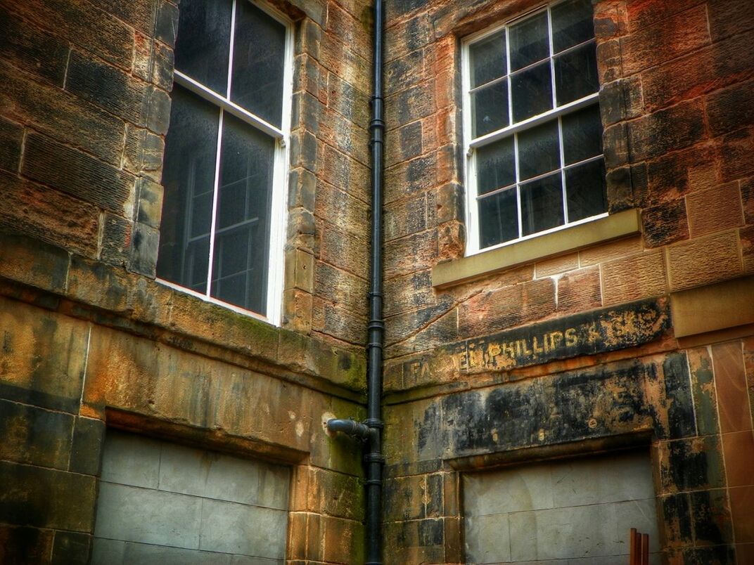 LOW ANGLE VIEW OF RESIDENTIAL BUILDING