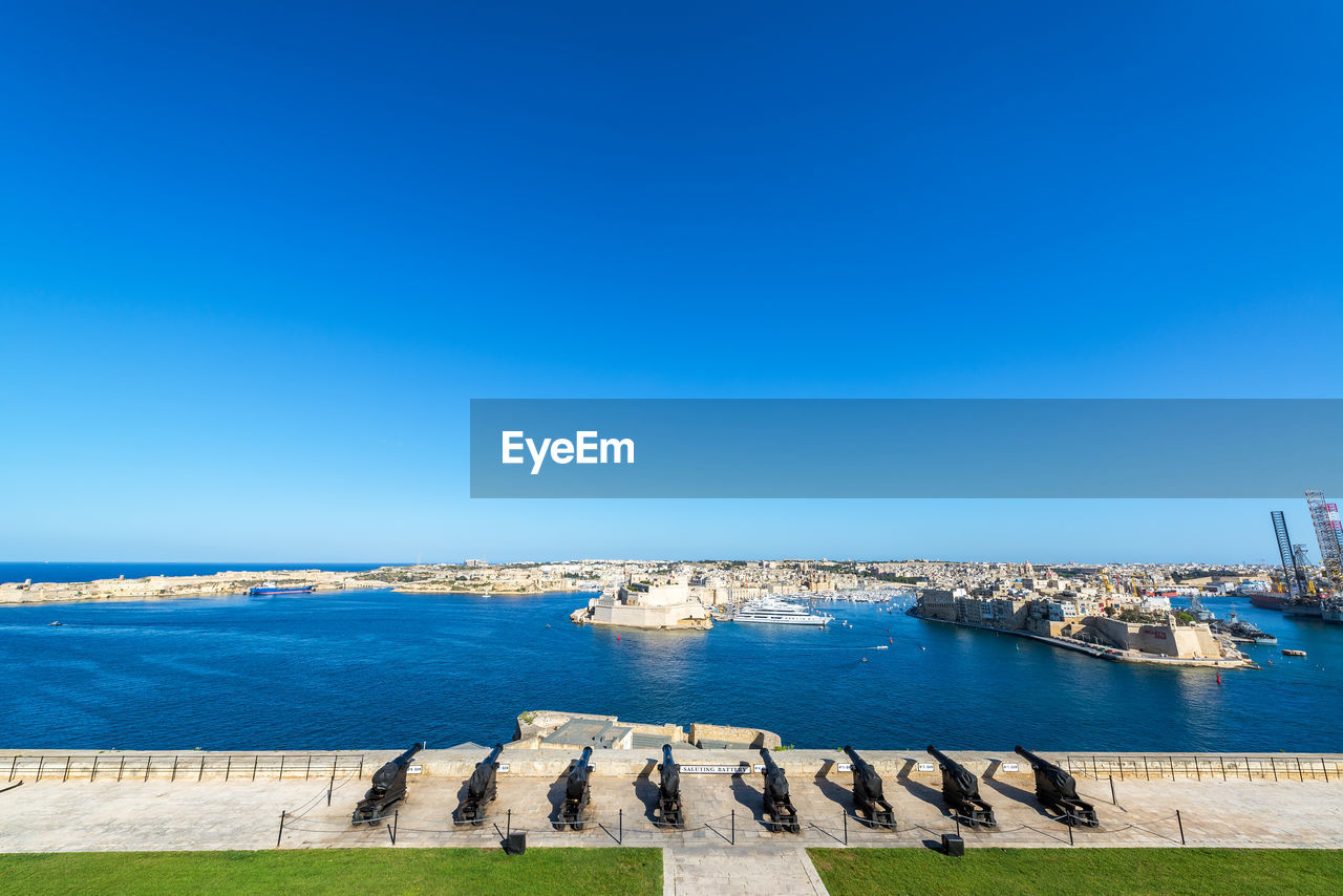 PANORAMIC VIEW OF SEA AGAINST CLEAR BLUE SKY