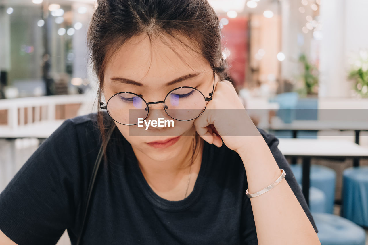 Woman sitting in cafe