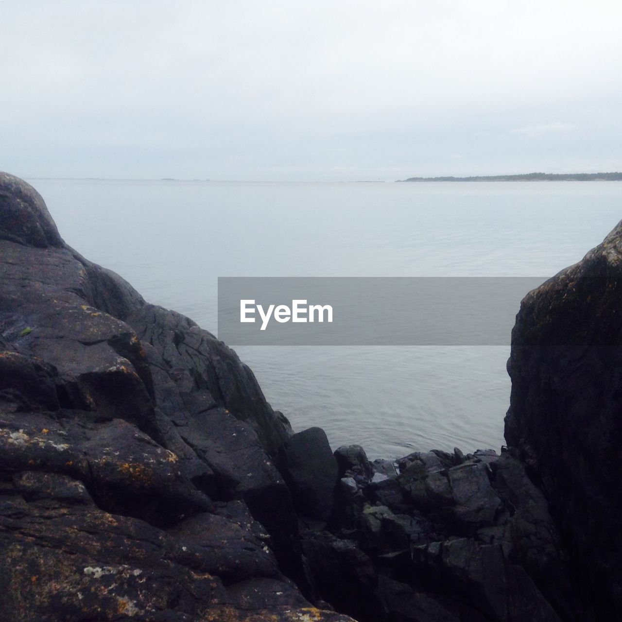 SCENIC VIEW OF SEA AND ROCK