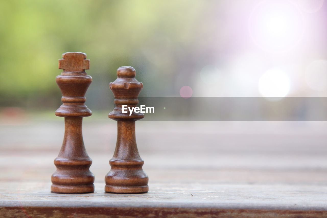 Close-up of chess piece on table