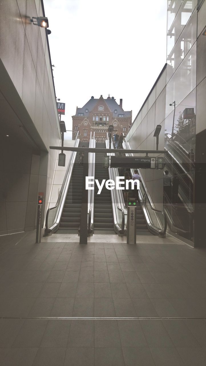 STAIRCASE OF BUILDING AGAINST SKY