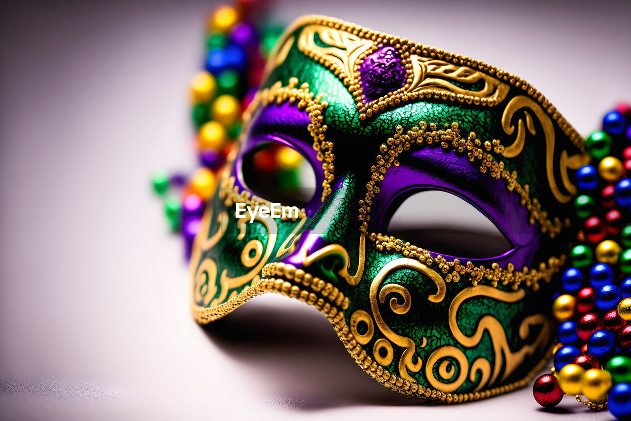masque, clothing, disguise, mask, mask - disguise, multi colored, carnival, celebration, ornate, close-up, tradition, costume, eye mask, arts culture and entertainment, venetian mask, no people, headgear, jewelry, single object, decoration, indoors, studio shot