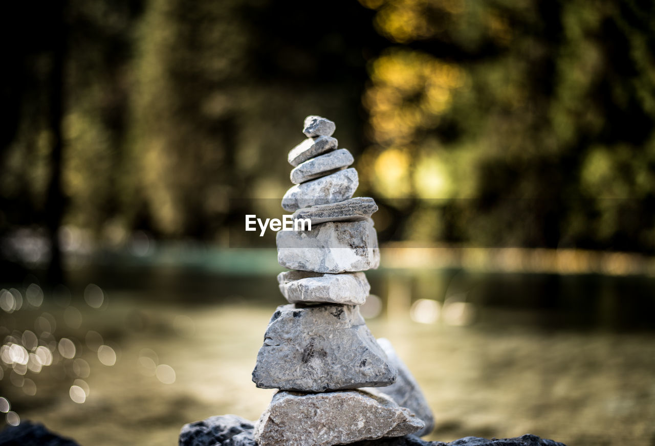 Close-up of stone stacked against defocused background