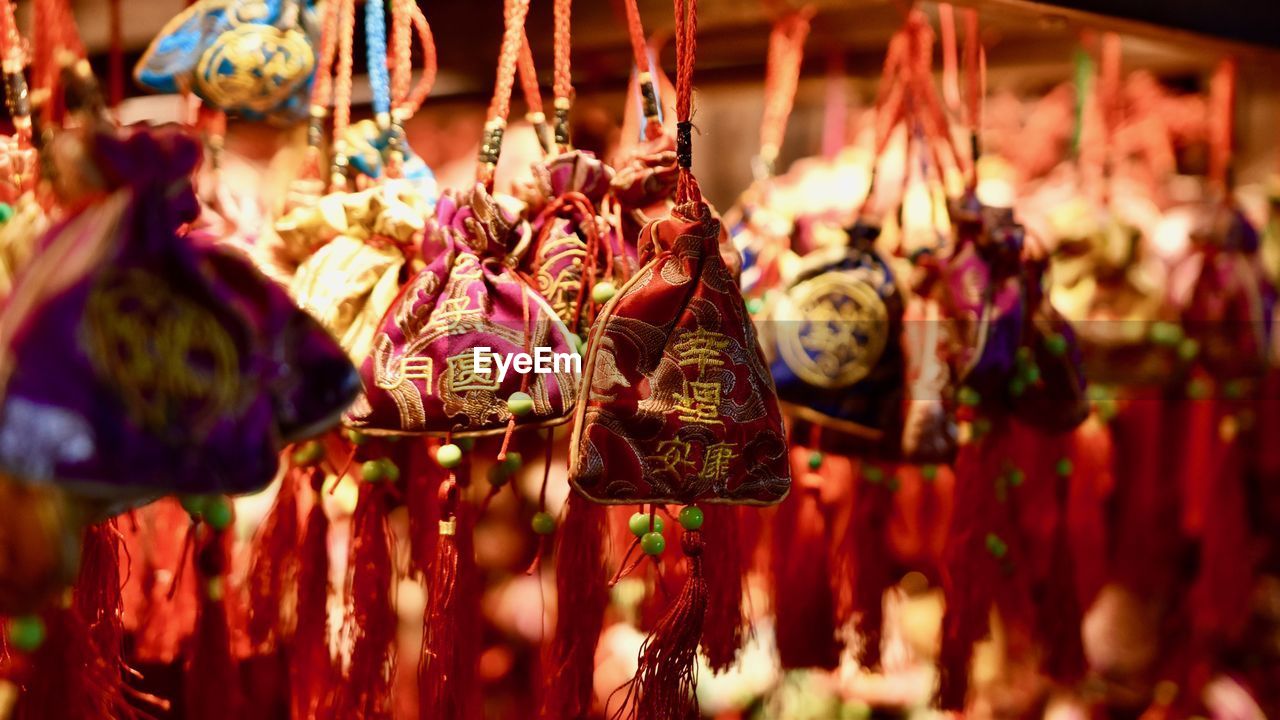 Close-up of decorations for sale at market stall