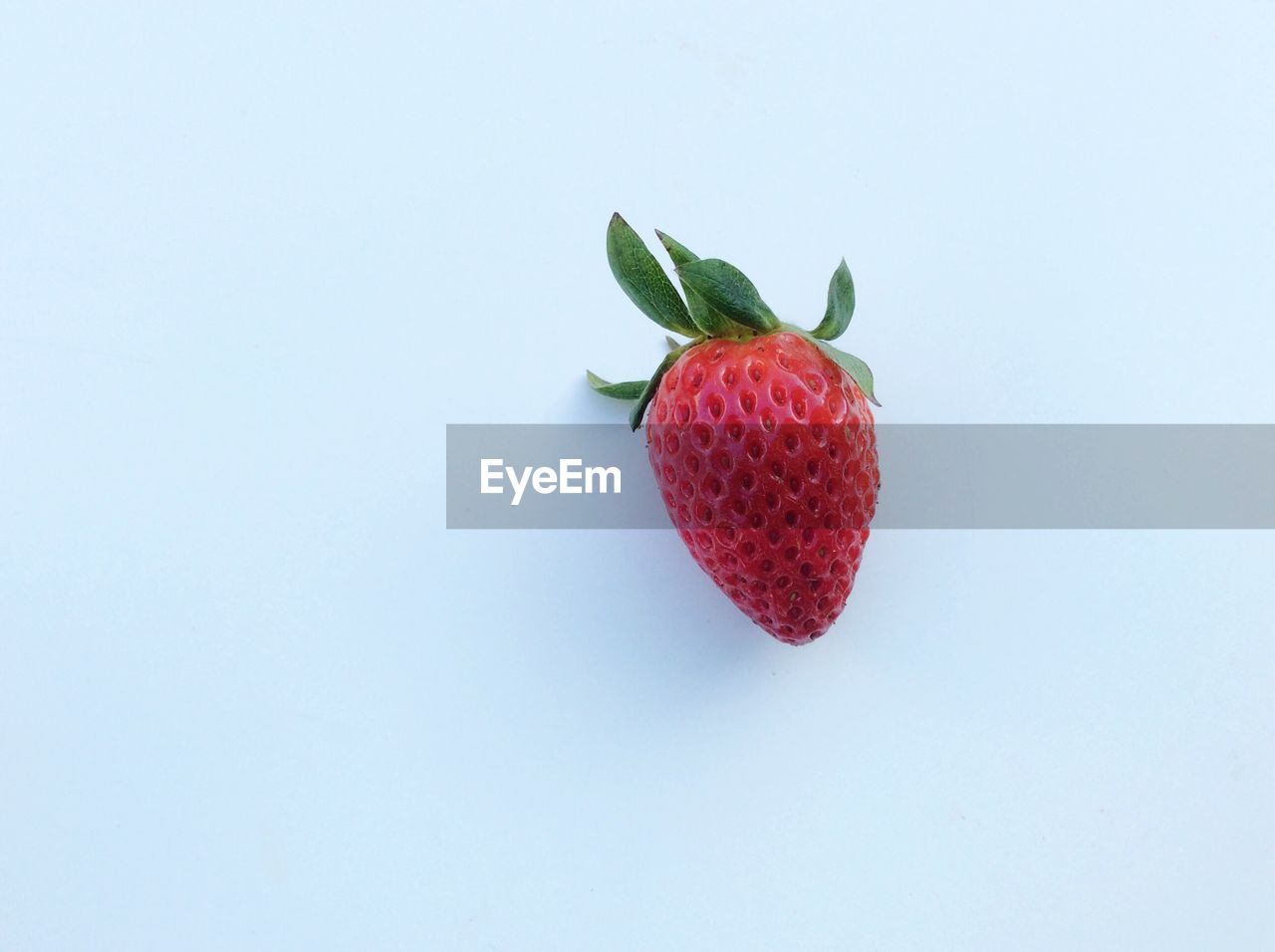 Close-up of strawberry on white background