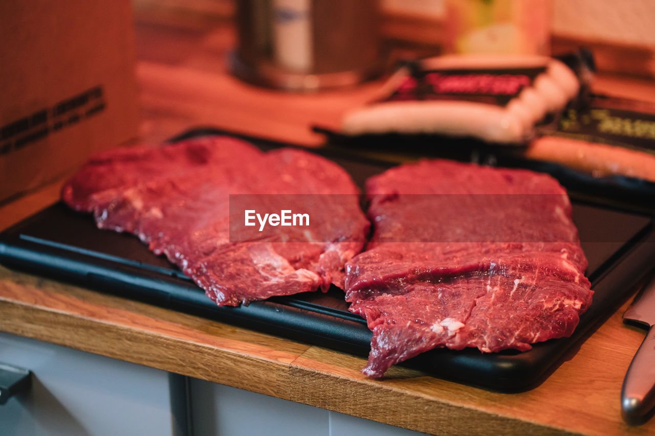 HIGH ANGLE VIEW OF MEAT ON BARBECUE