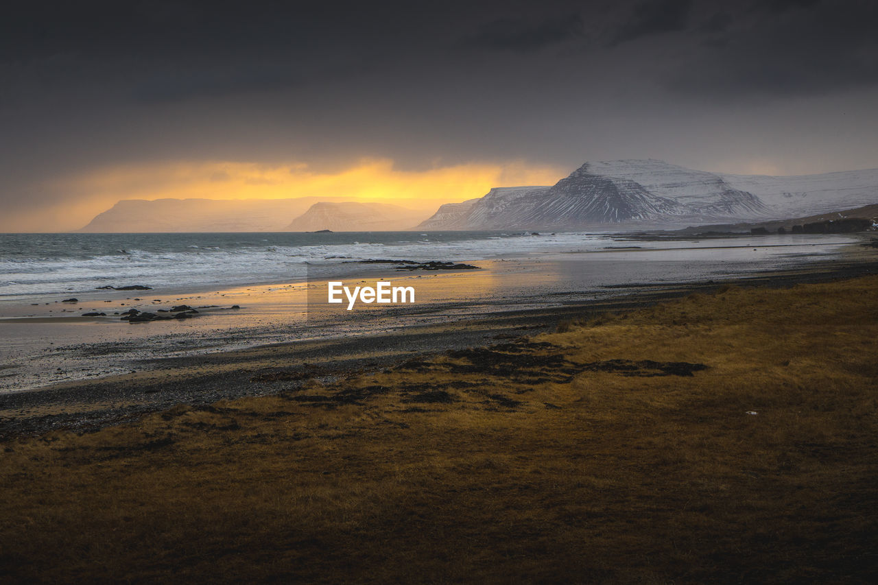 Scenic view of sea against sky during sunset