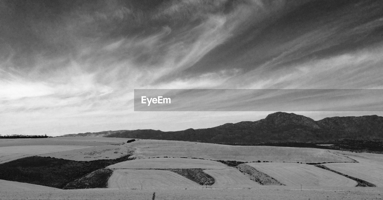Landscape with fields and mountains