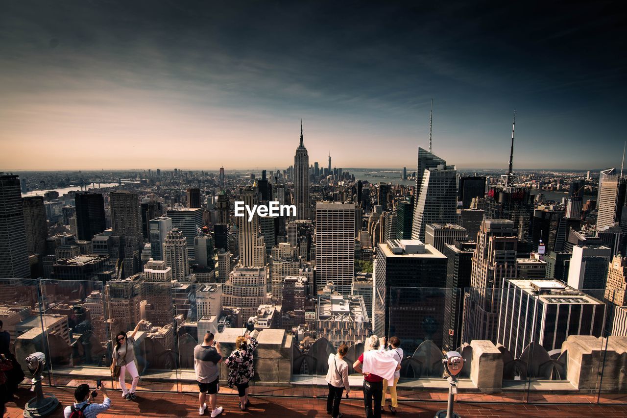 High angle view of people looking at cityscape