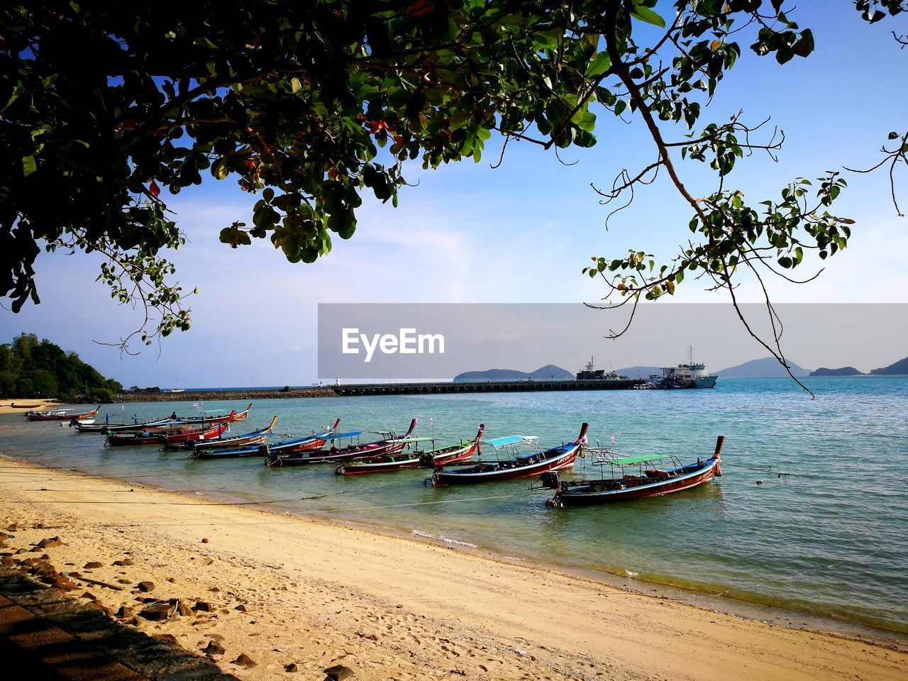 Boats moored at shore