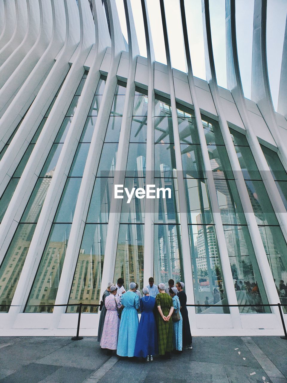 PEOPLE IN FRONT OF BUILDING