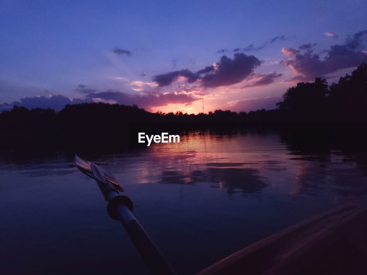 SILHOUETTE TREES BY LAKE AGAINST SKY DURING SUNSET