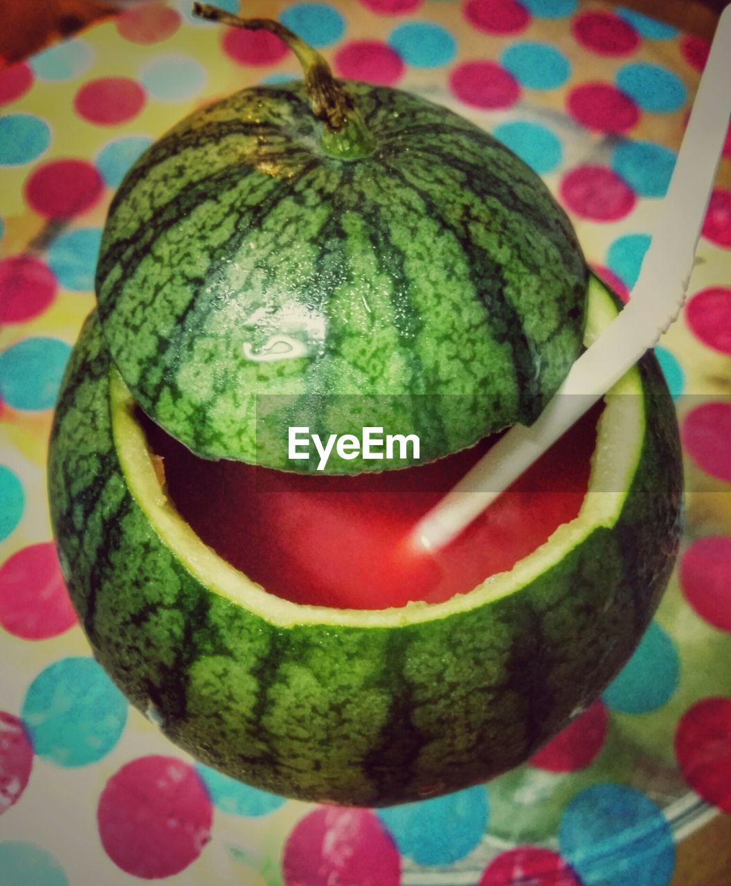 High angle view of juice in watermelon on table