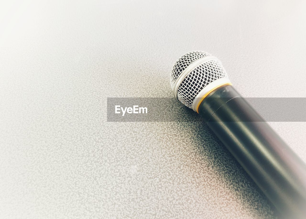 Close-up of microphone on table