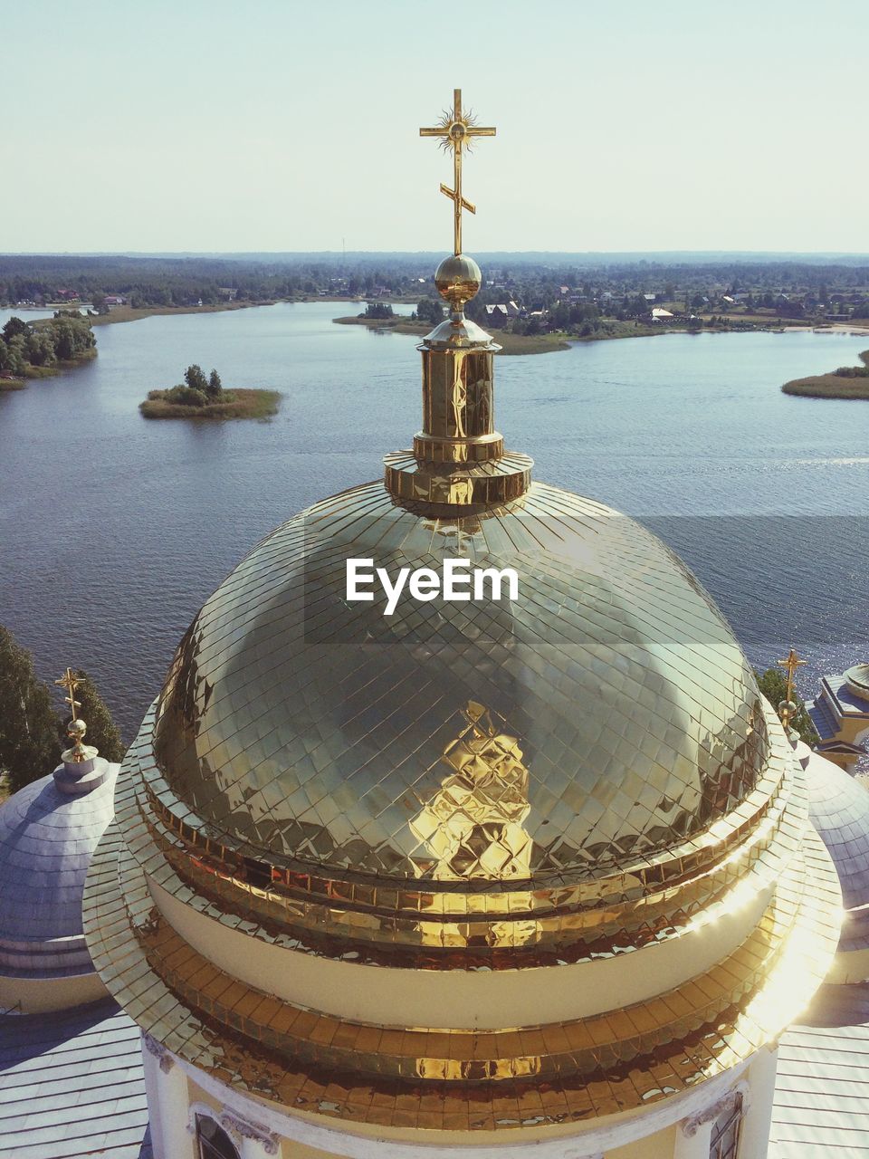 Dome of nilov monastery against lake