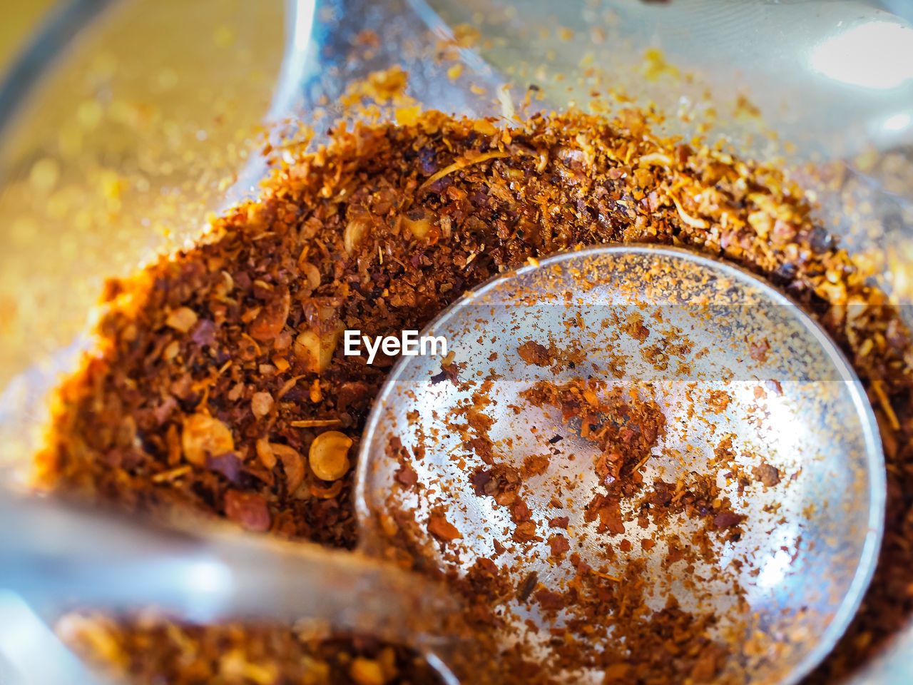 Close-up of spoon in chili pepper