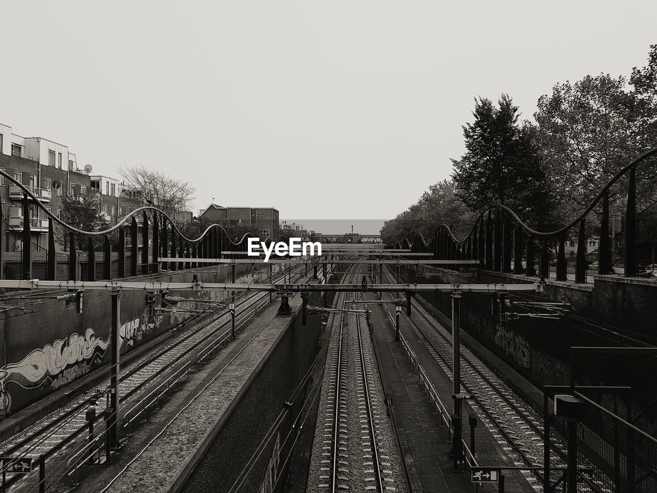 RAILWAY TRACKS AGAINST SKY