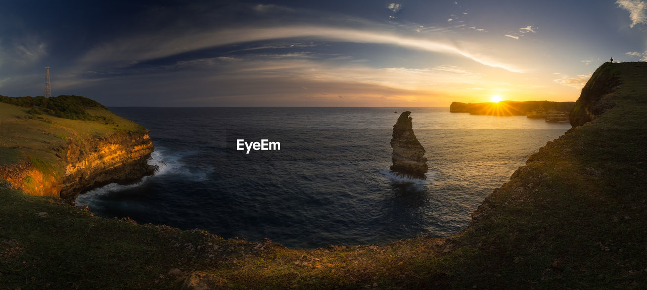 SCENIC VIEW OF SEA DURING SUNSET
