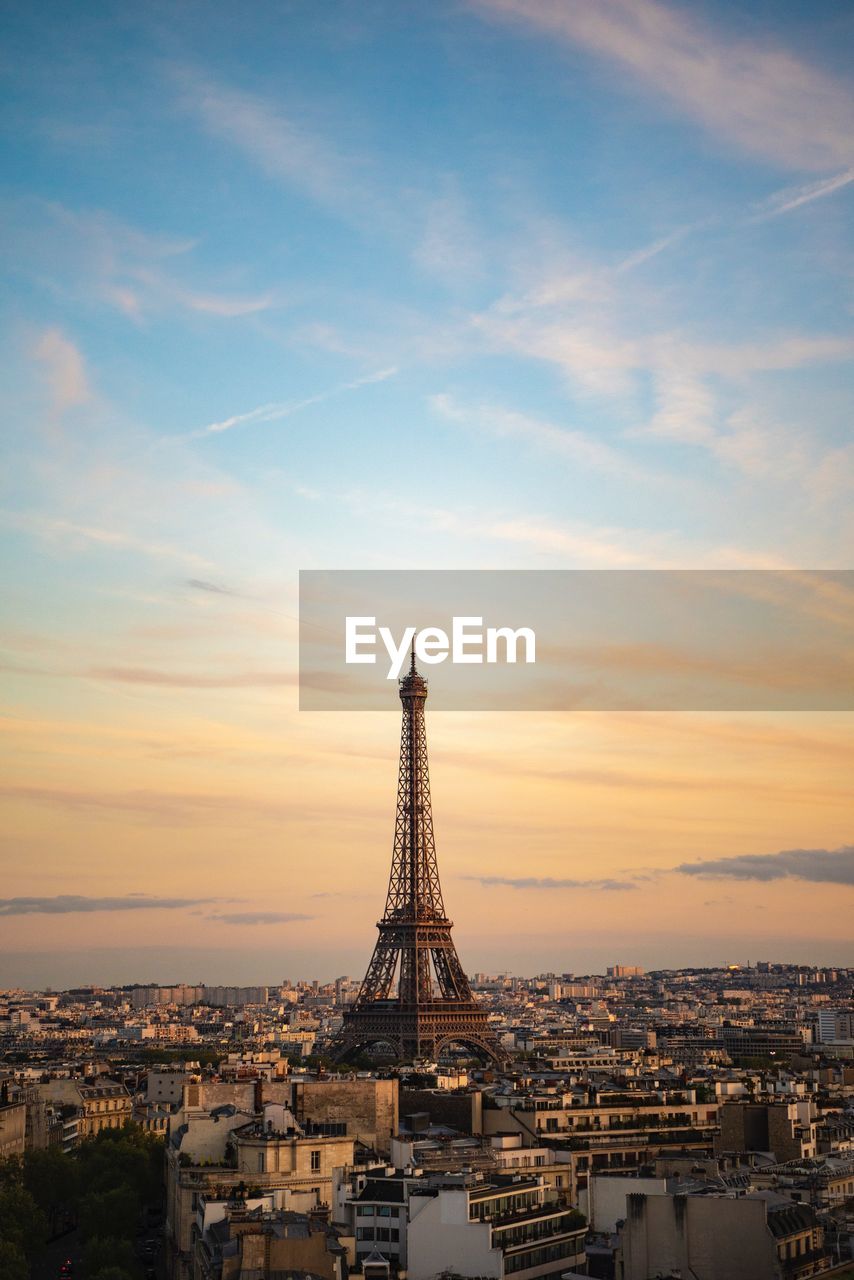 Buildings in city against sky during sunset, eiffel tower paris 