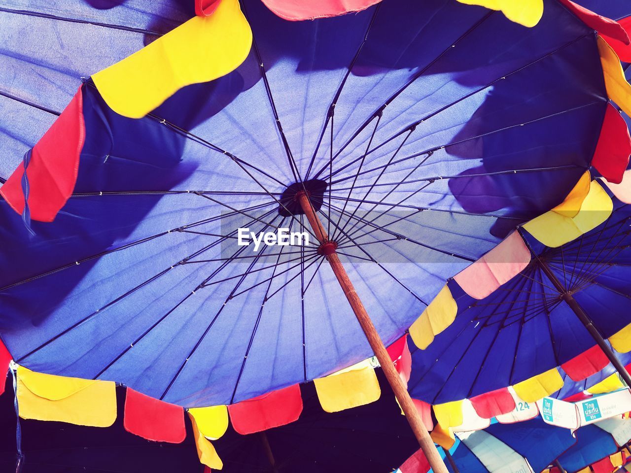 Low angle view of multi colored parasol