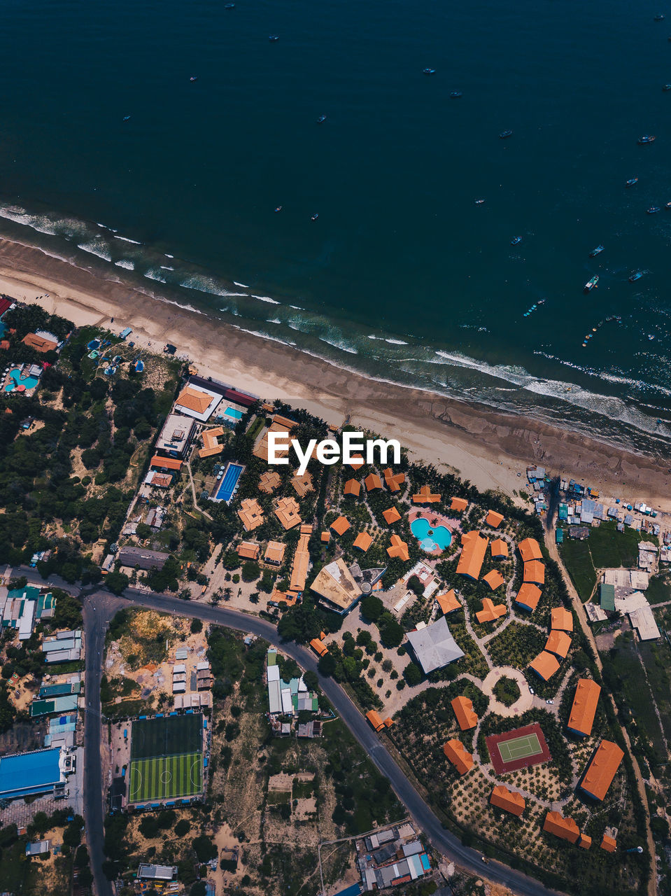 Aerial view of sea and houses