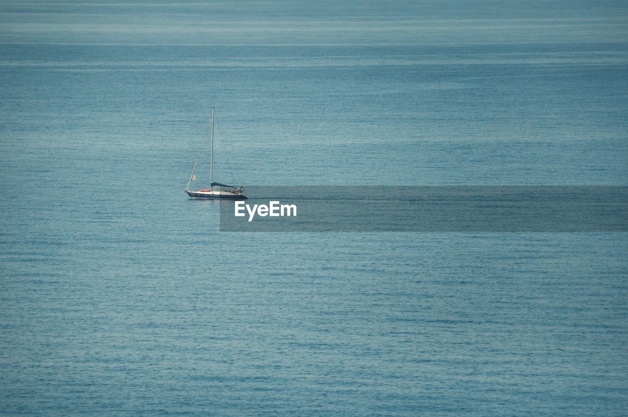 Boat sailing in sea