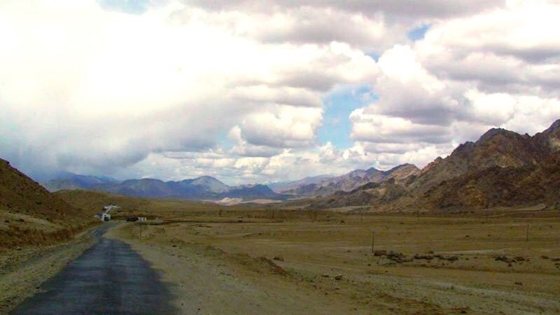 ROAD PASSING THROUGH LANDSCAPE