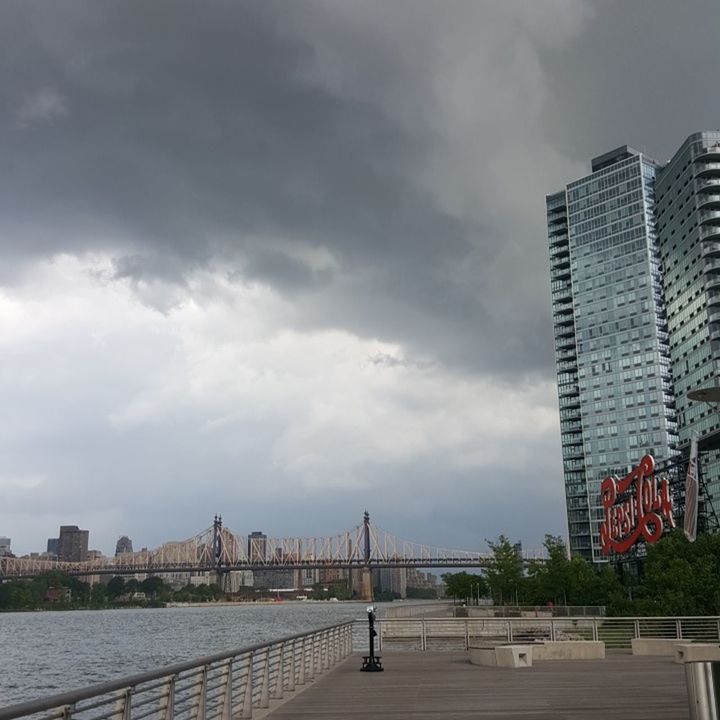 VIEW OF CLOUDY SKY OVER CITY