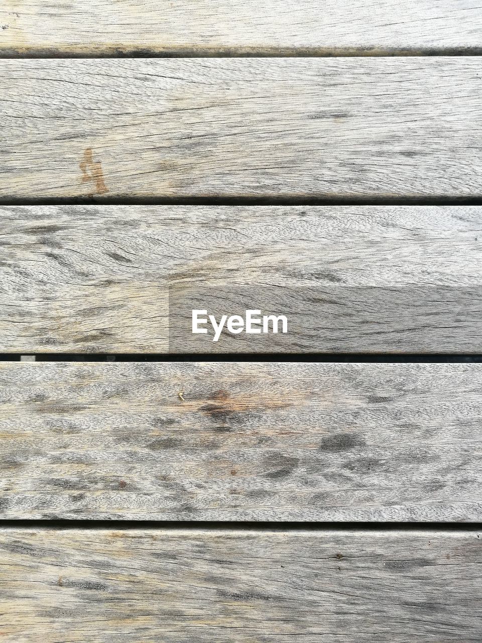 CLOSE-UP OF WEATHERED WOOD