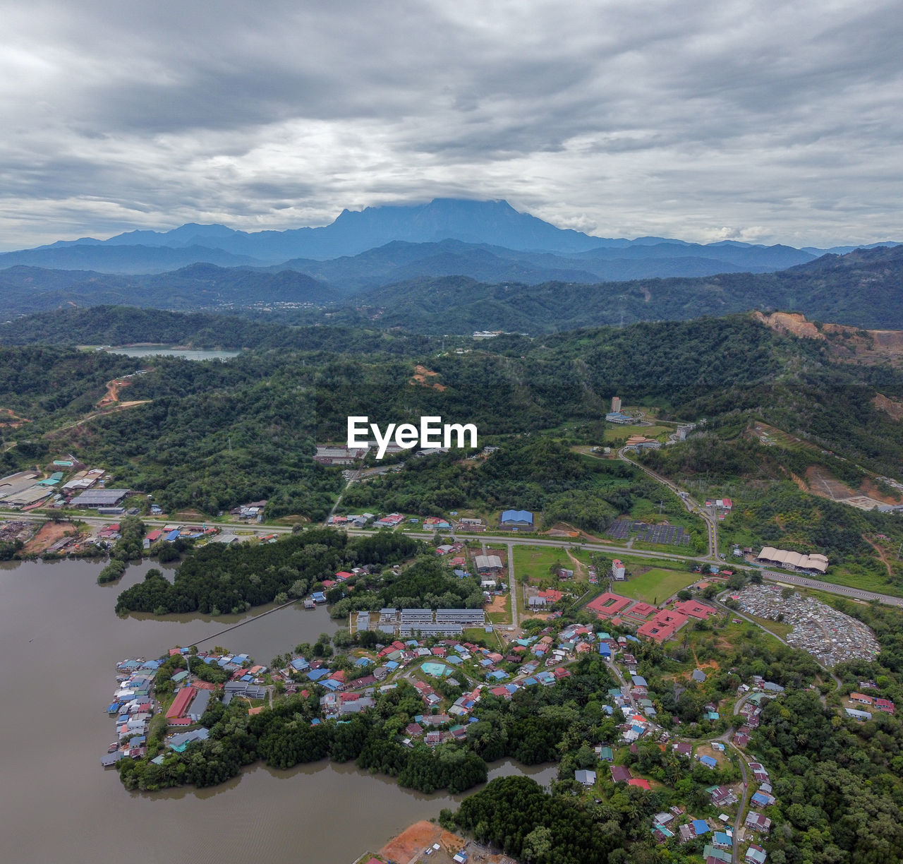 AERIAL VIEW OF CITY AND BUILDINGS AGAINST SKY